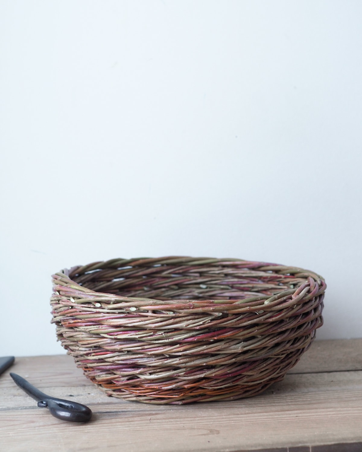 A textured willow bowl woven in rope coil